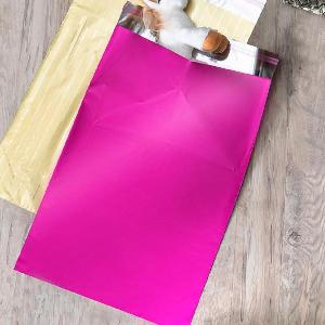 Fuchsia 15 " x 22 3/8" Adhesive Merchandise Bag - 15 " x 22 3/8"