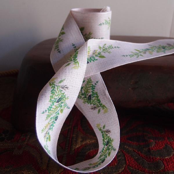 1 1/2" Tan ribbon with green leaves - 1.5" x 10.9 yards