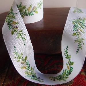 1 1/2" White ribbon with green leaves. - 1.5" x 10.9 yards